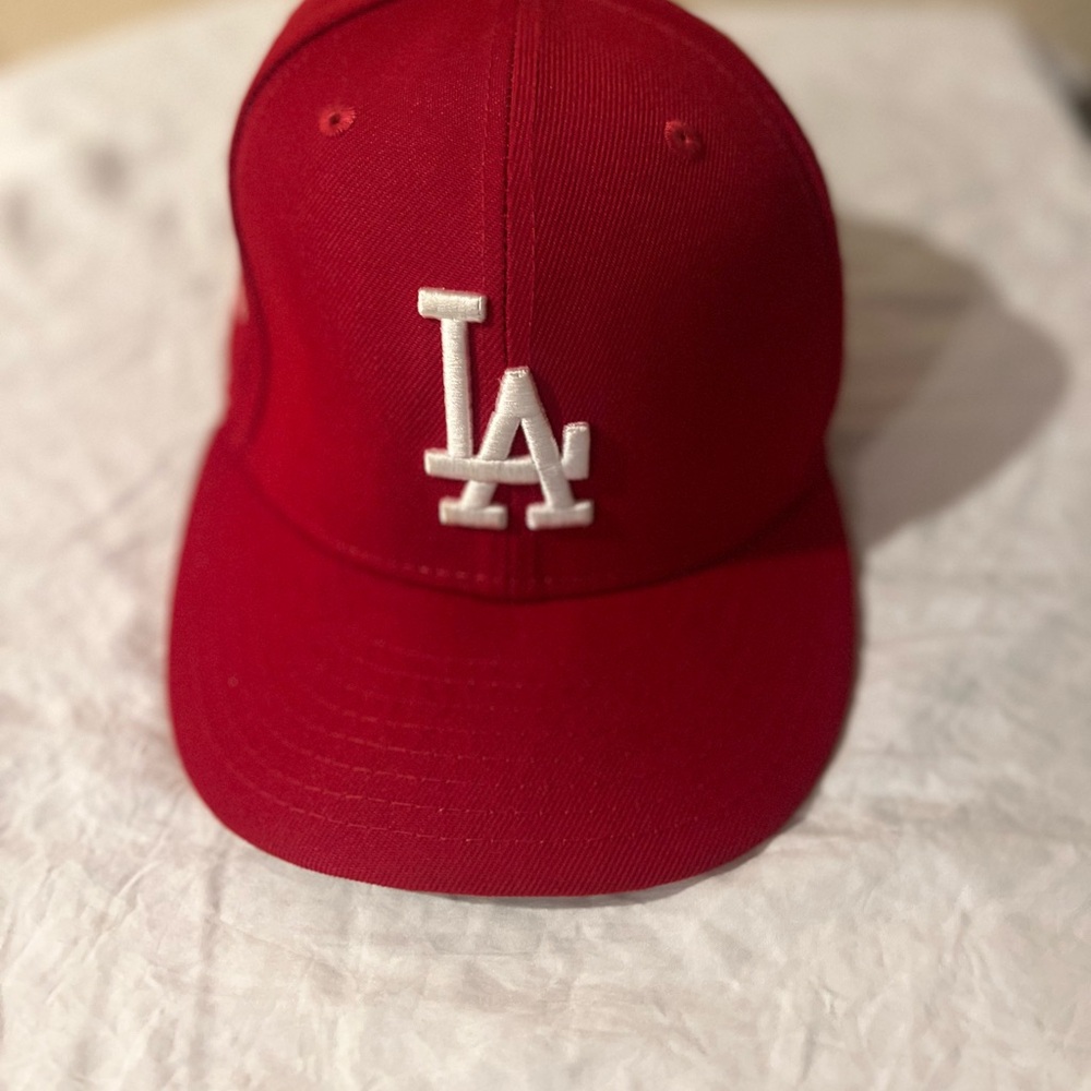 Genuine Merchandise Red Baseball Cap with White Logo